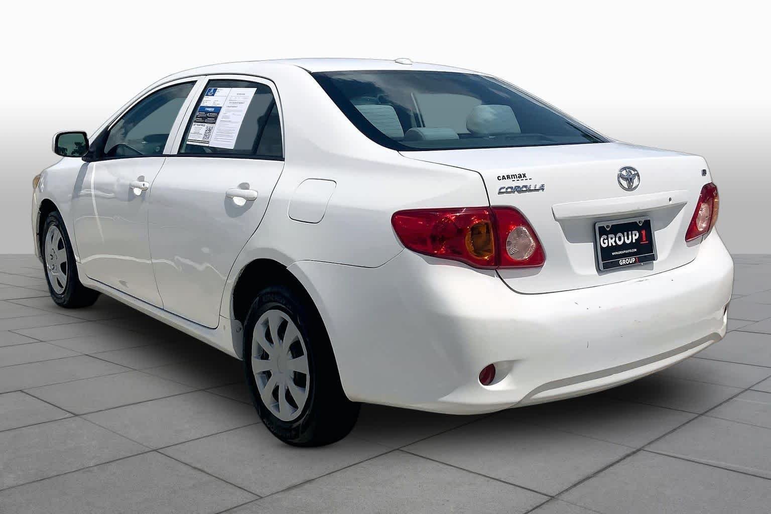 Used 2010 Super White Toyota LE image 11