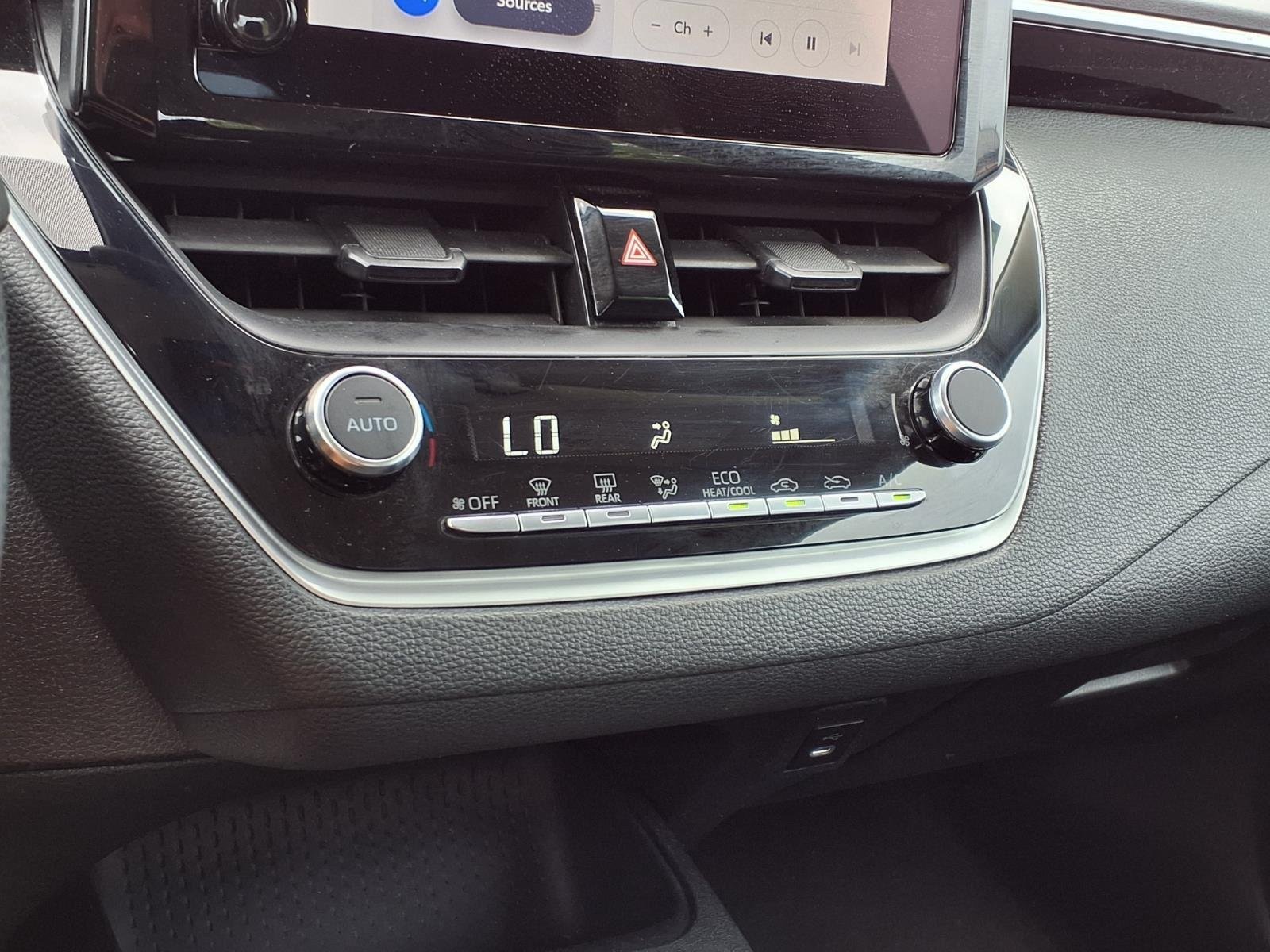 Used 2024 Midnight Black Metallic Toyota LE image 25