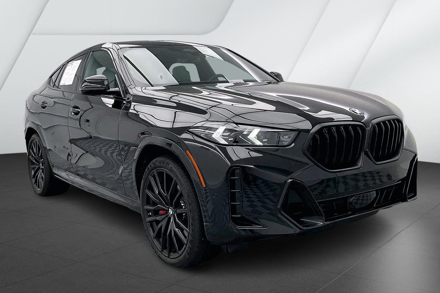 Certified Used 2025 Black Sapphire Metallic BMW xDrive40i image 11