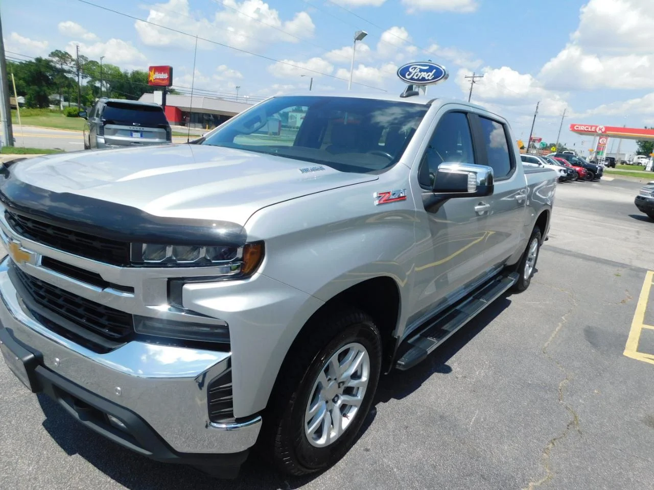 Used 2020 Silver Chevrolet 4WD CREW CAB 147 in LT image 4