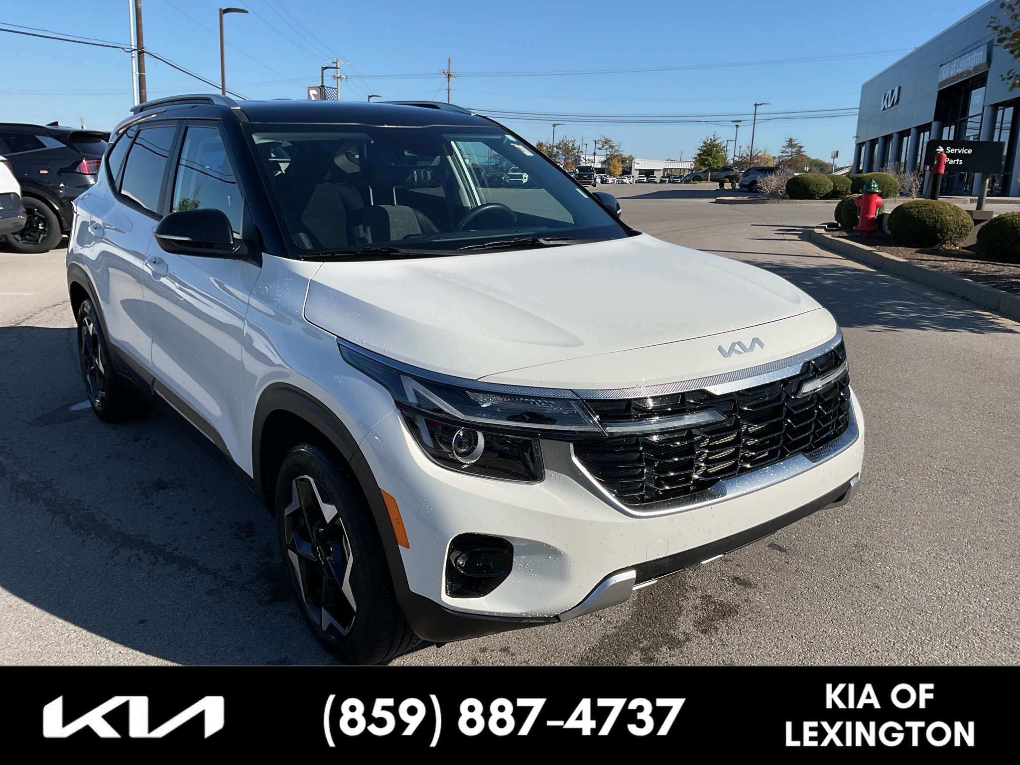 Used 2025 Clear White/Black Roof Kia S image 1