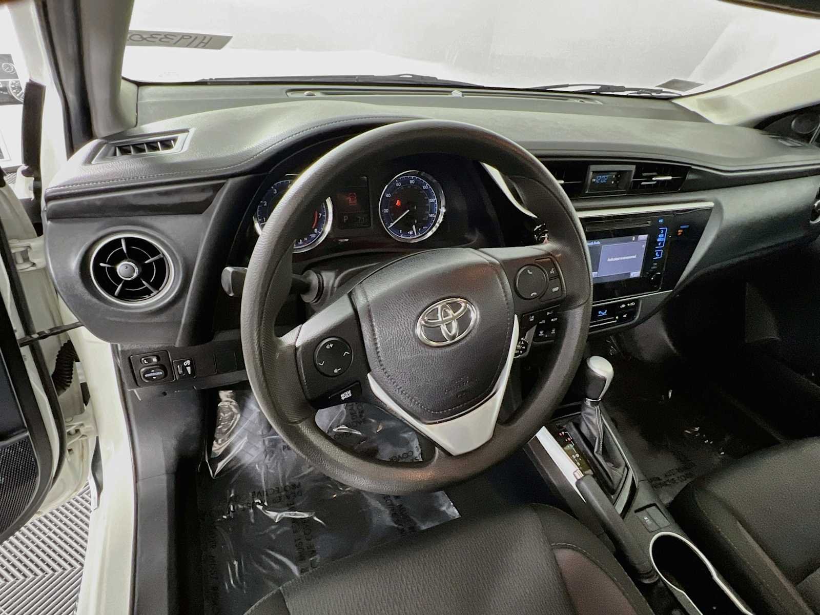 Used 2018 Super White Toyota LE image 11