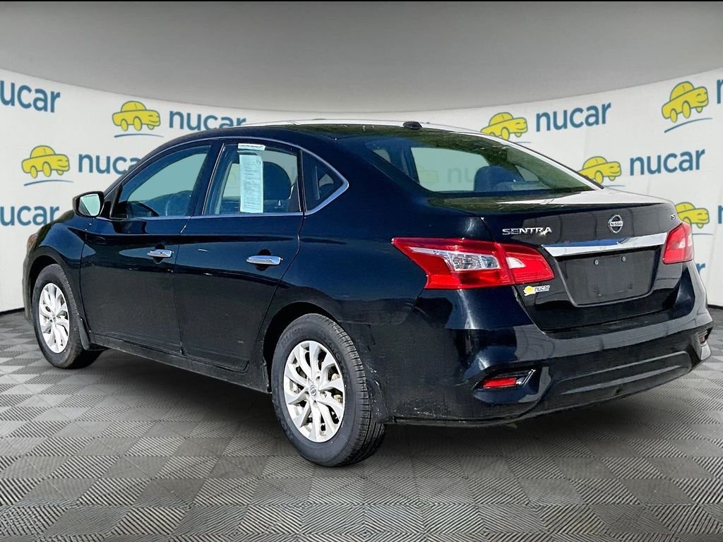 Used 2019 Super Black Nissan SV image 4
