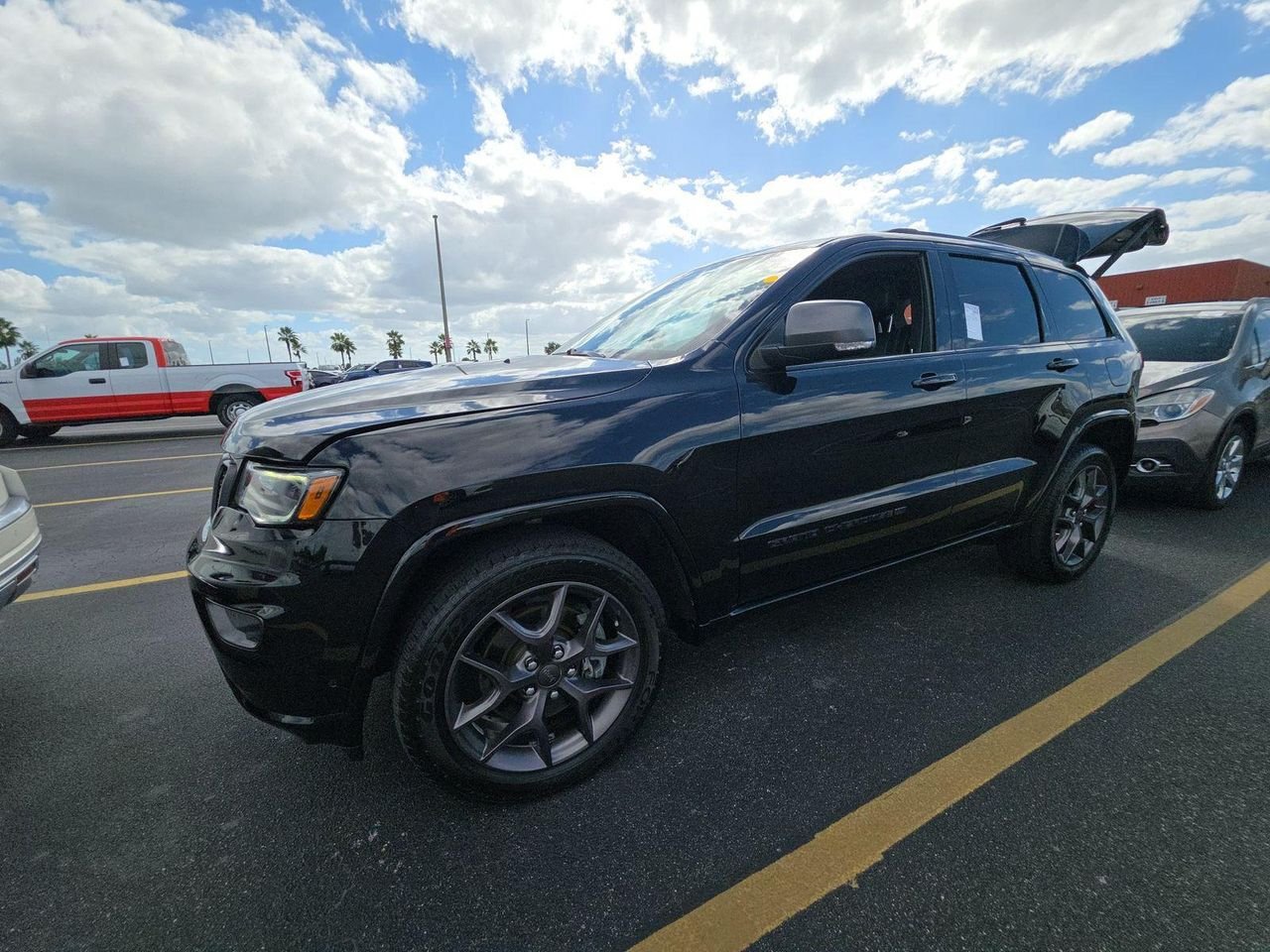 Used 2021 Diamond Black Crystal Pearlcoat Jeep 80th Anniversary 4x4 image 1