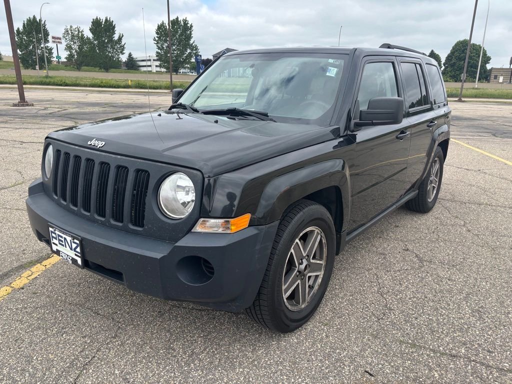Used 2010 Black Jeep Sport image 3
