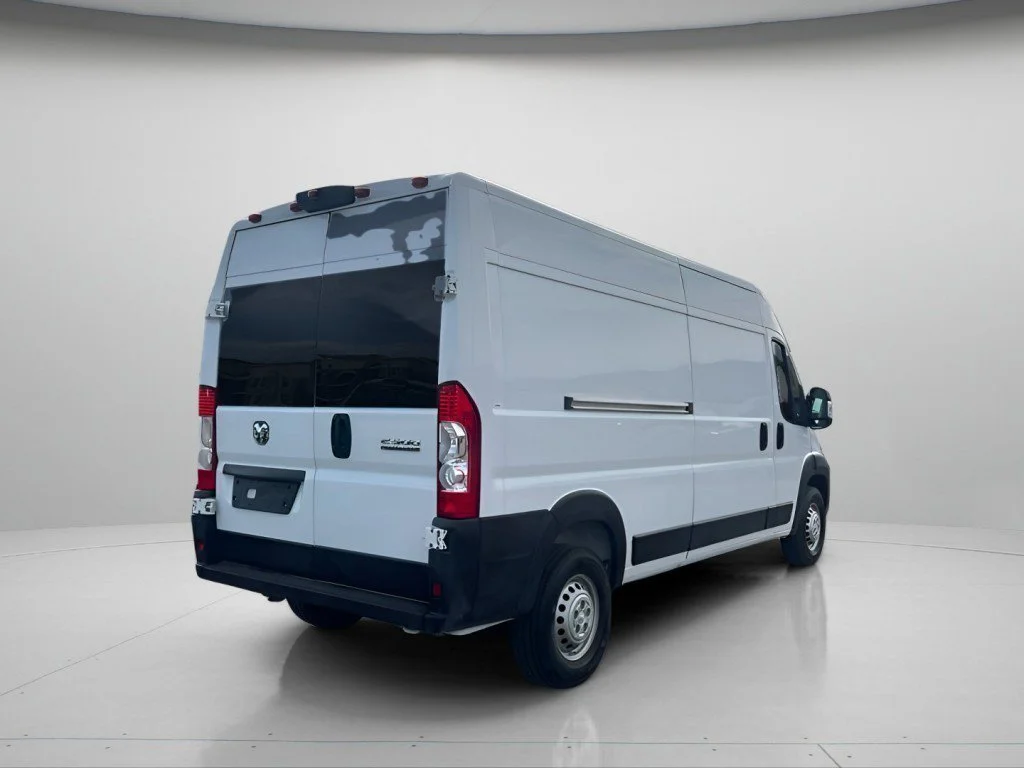 Used 2025 Bright White Clearcoat Ram High Roof image 6
