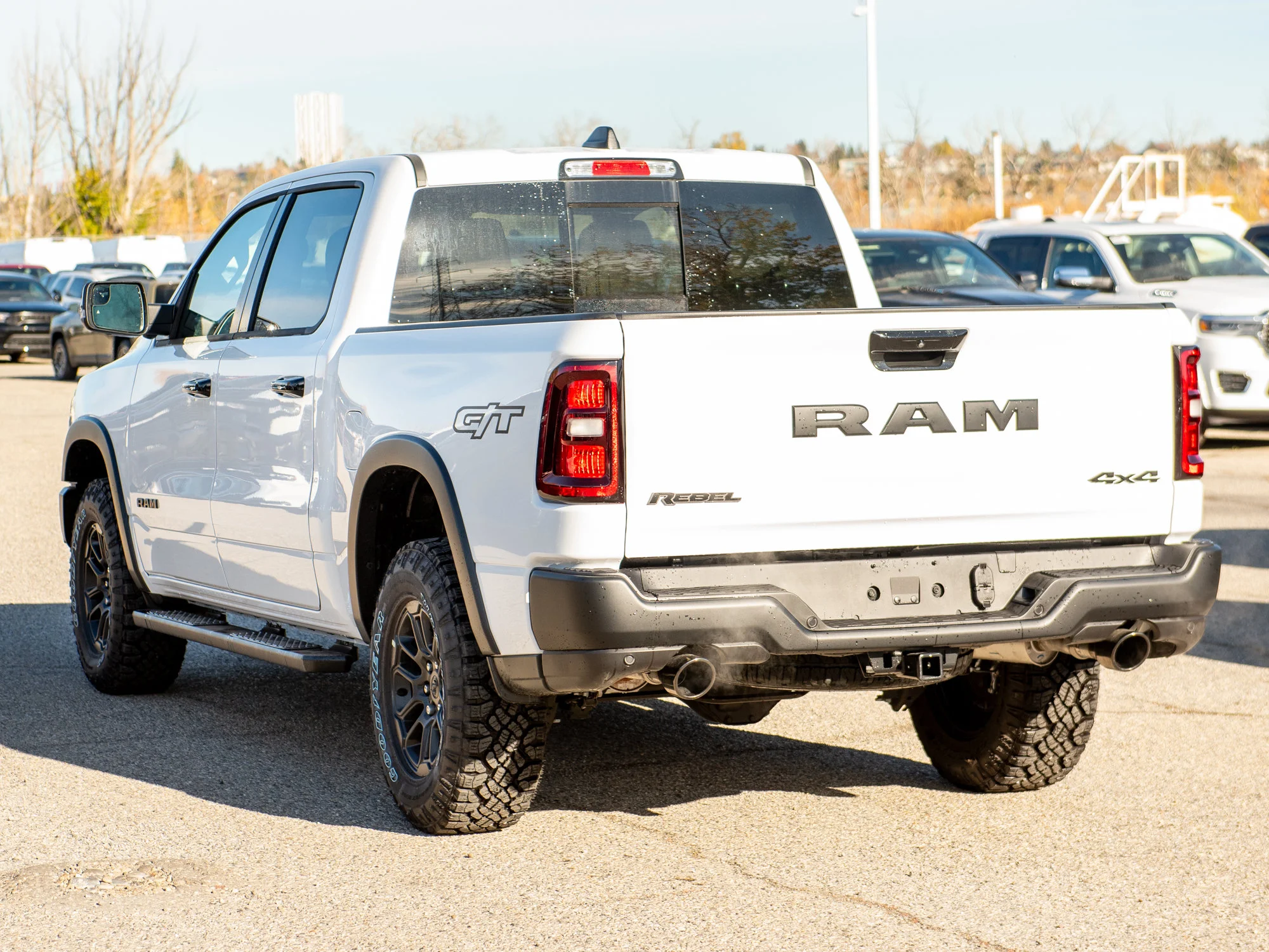 New 2026 White RAM Rebel G/T* Crew Cab 4x4, Pano Sunroof, Passive Cold End Exhaust, Passenger Screen image 4