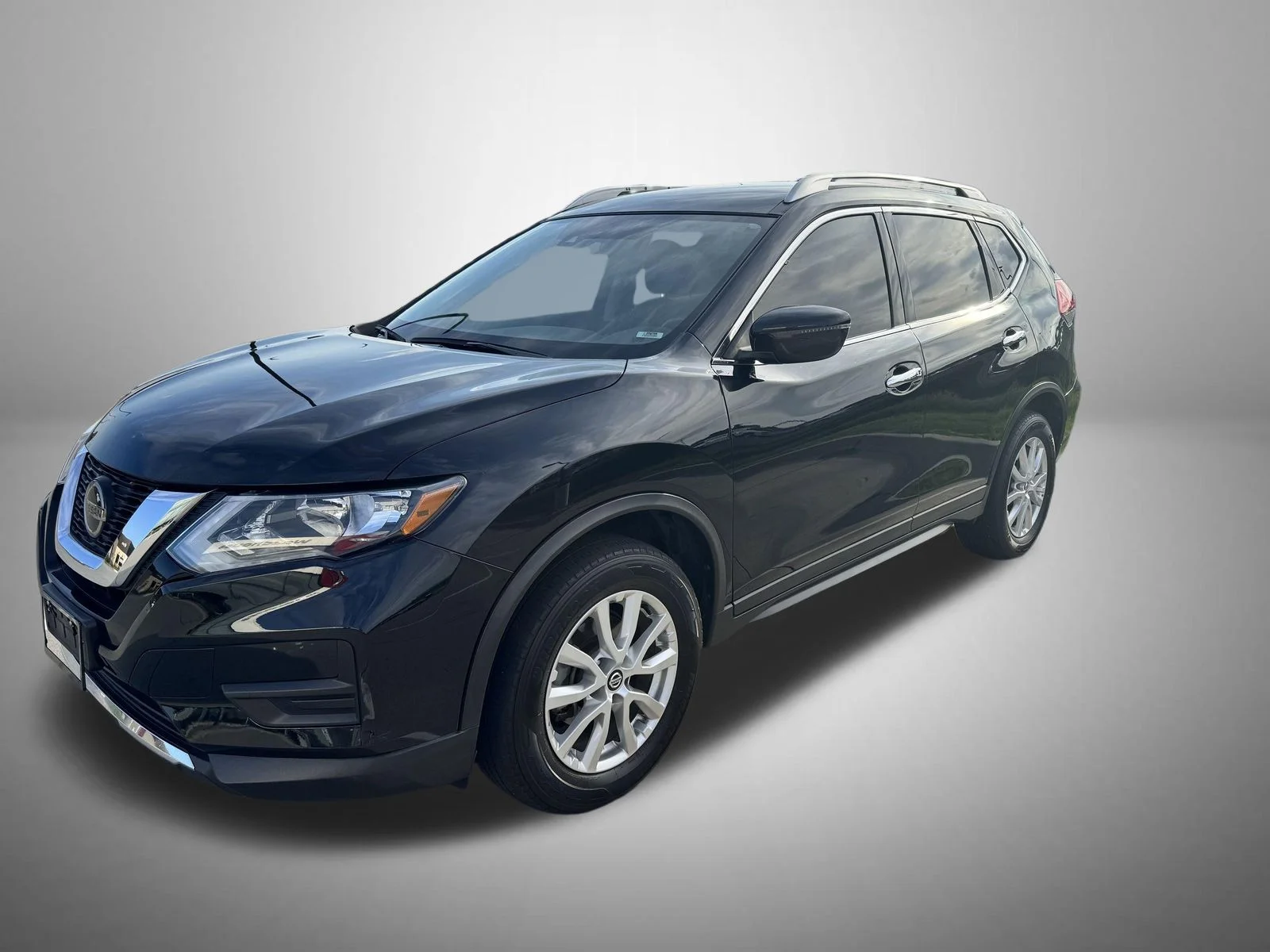 Used 2020 Black Nissan SV image 1