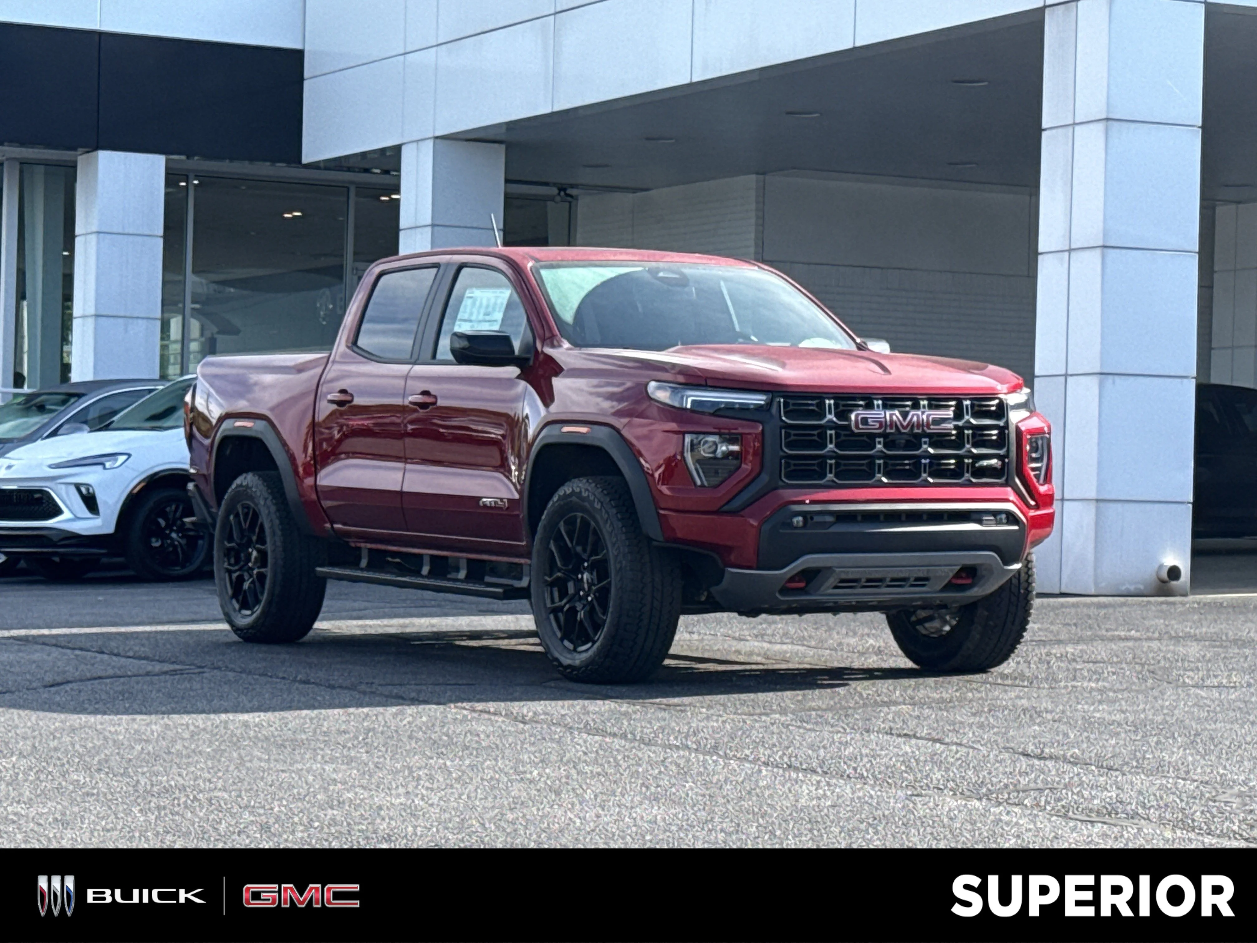 New 2026 Volcanic Red Tintcoat GMC 4WD AT4 image 1