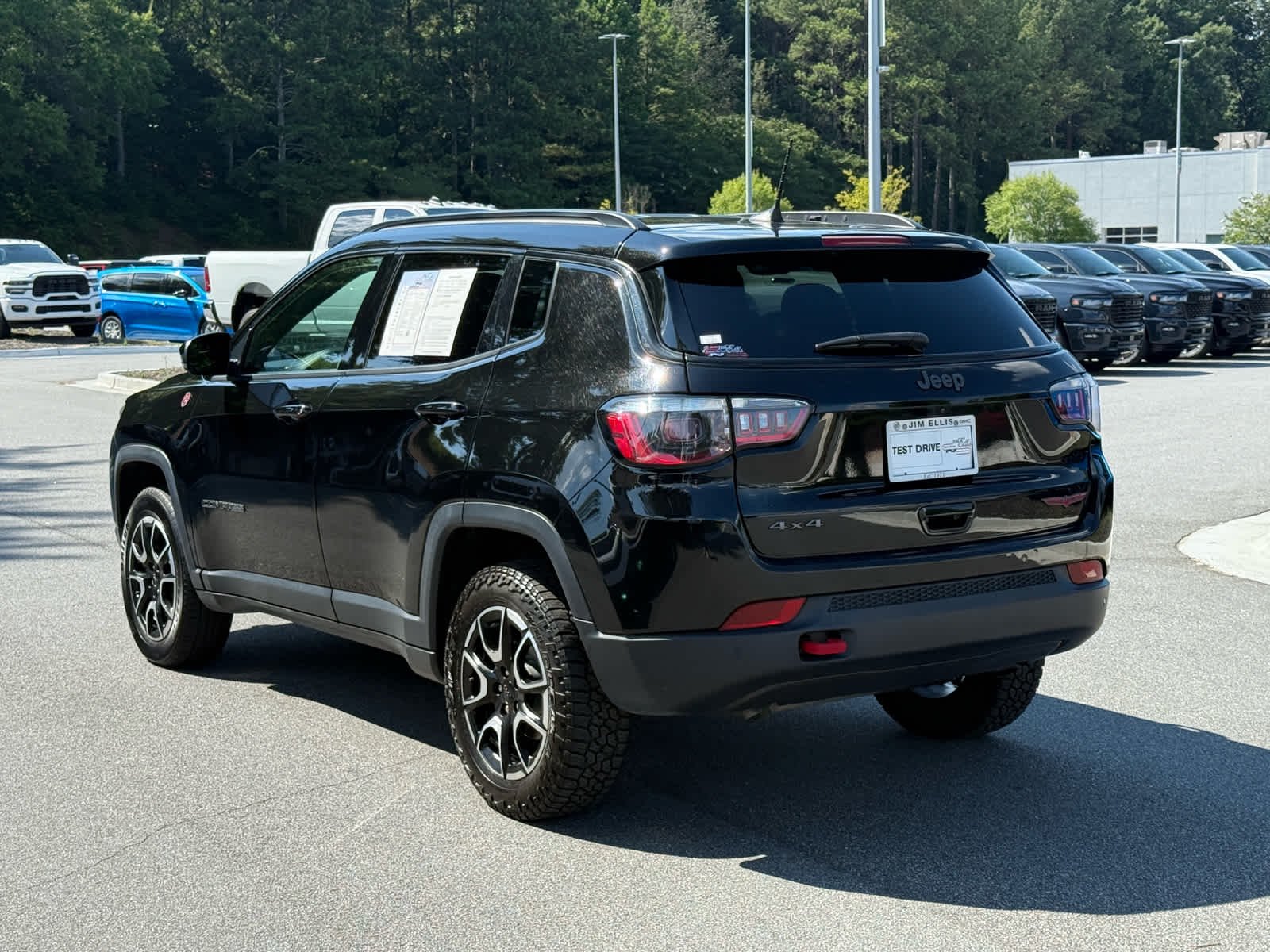 Used 2024 Diamond Black Crystal Pearlcoat Jeep Trailhawk image 3