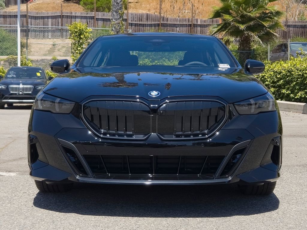 New 2026 Black Sapphire Metallic BMW 550e xDrive image 3