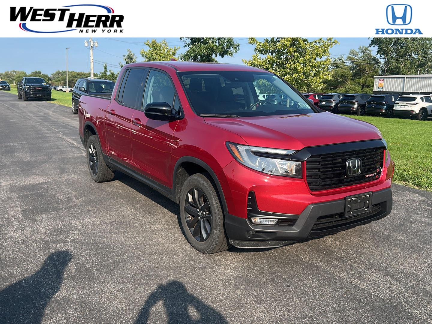 Used 2023 Radiant Red Metallic II Honda Sport image 1