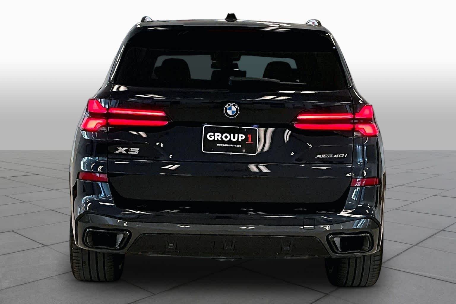 Used 2024 Carbon Black Metallic BMW xDrive40i image 4