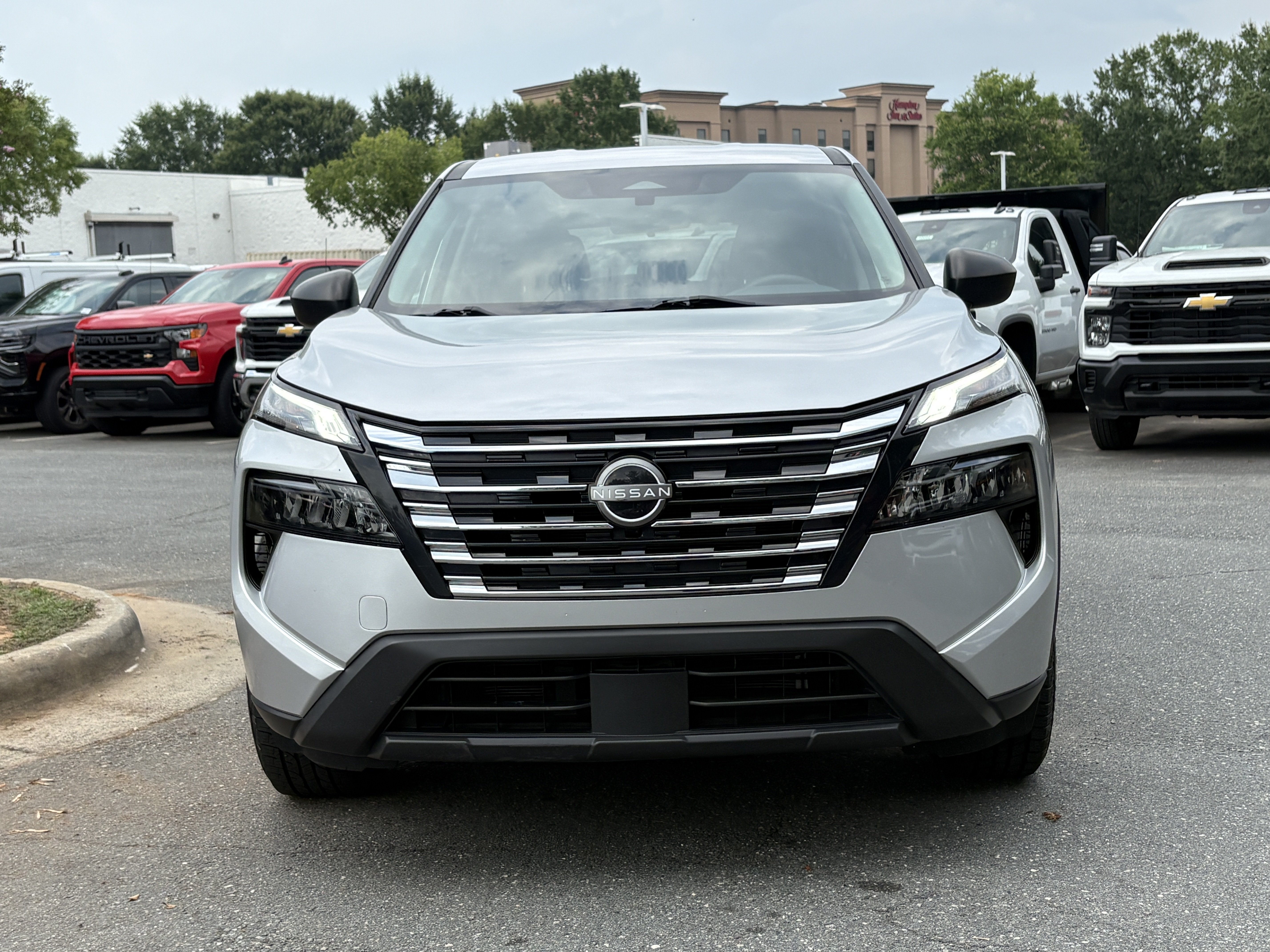 Used 2024 Brilliant Silver Metallic Nissan S image 7
