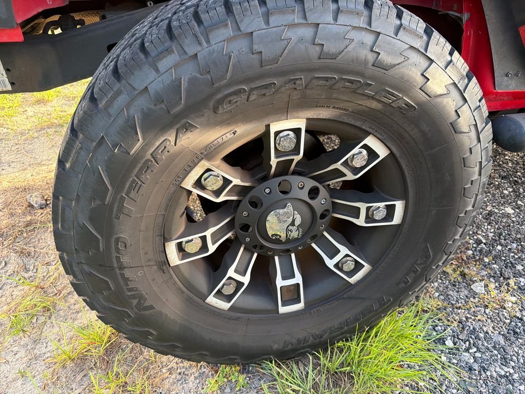 Used 2015 Red Jeep Unlimited Sport image 14