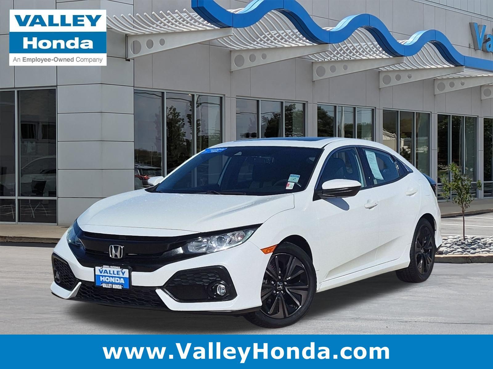 Certified Used 2019 White Orchid Pearl Honda EX Hatchback image 1