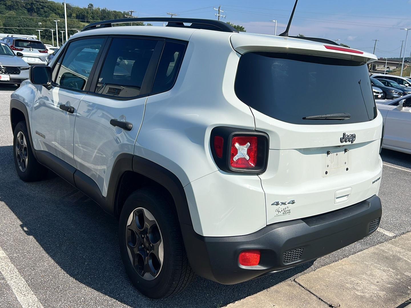 Used 2018 Alpine White Jeep Sport image 2