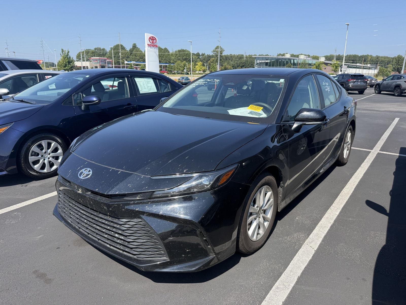 Used 2025 Midnight Black Metallic Toyota LE image 19