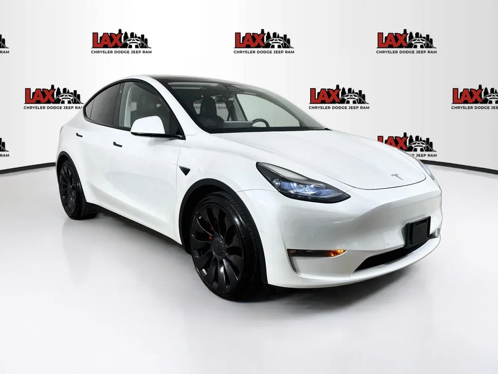Used 2022 Yellow Tesla Performance image 1
