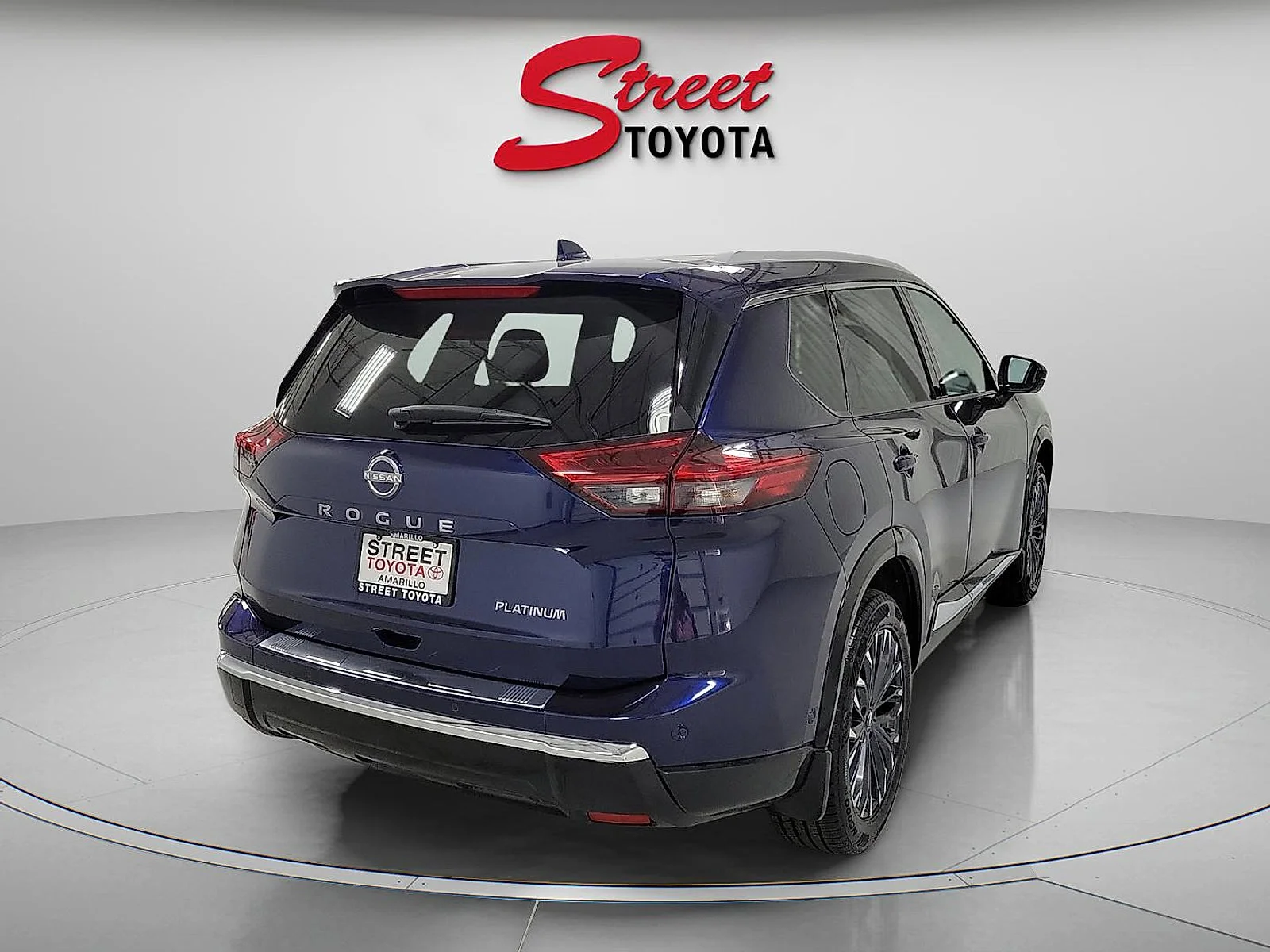 Used 2024 Deep Ocean Blue Pearl Nissan Platinum image 4