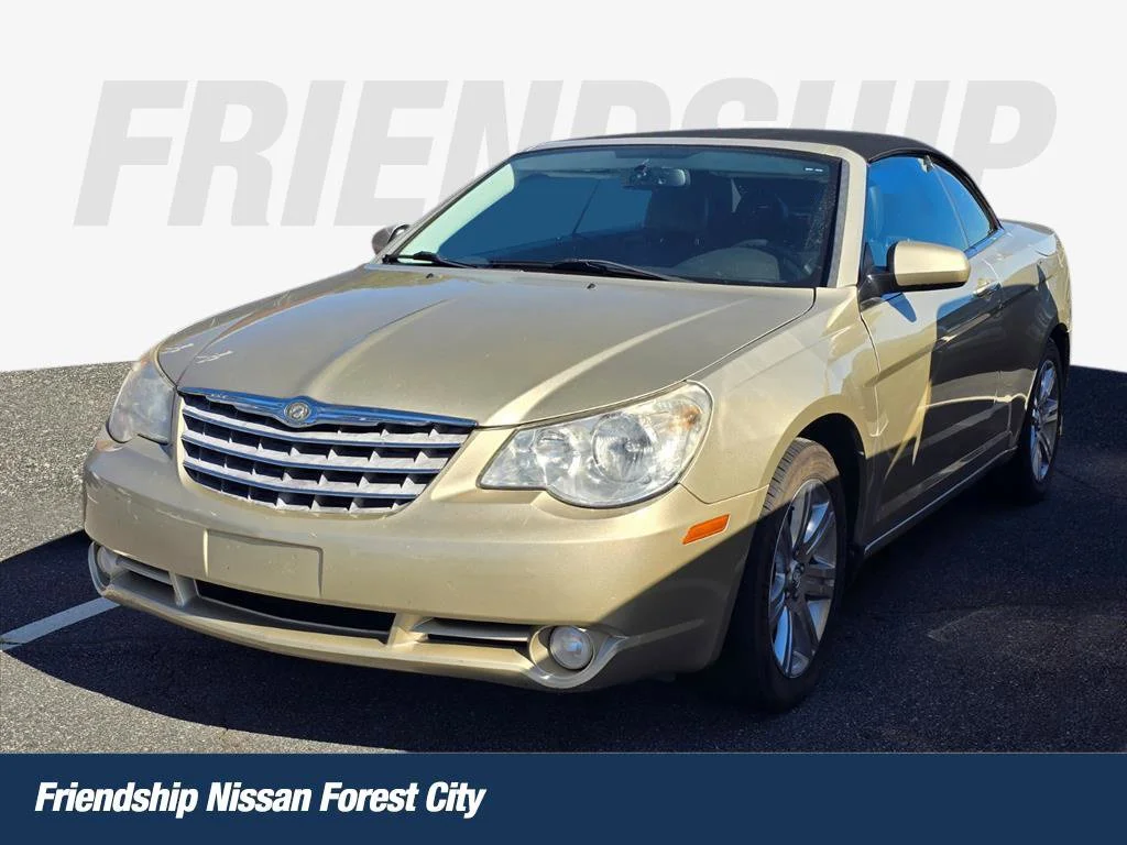Used 2010 Gold Chrysler Touring image 1