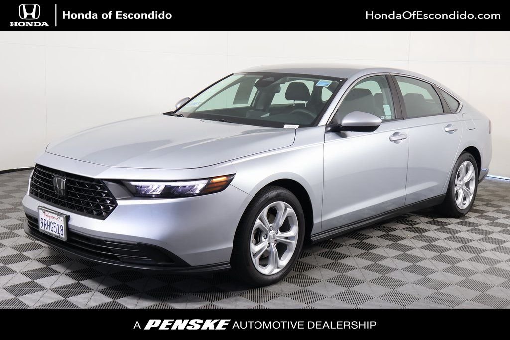 Used 2024 Solar Silver Metallic Honda LX image 1