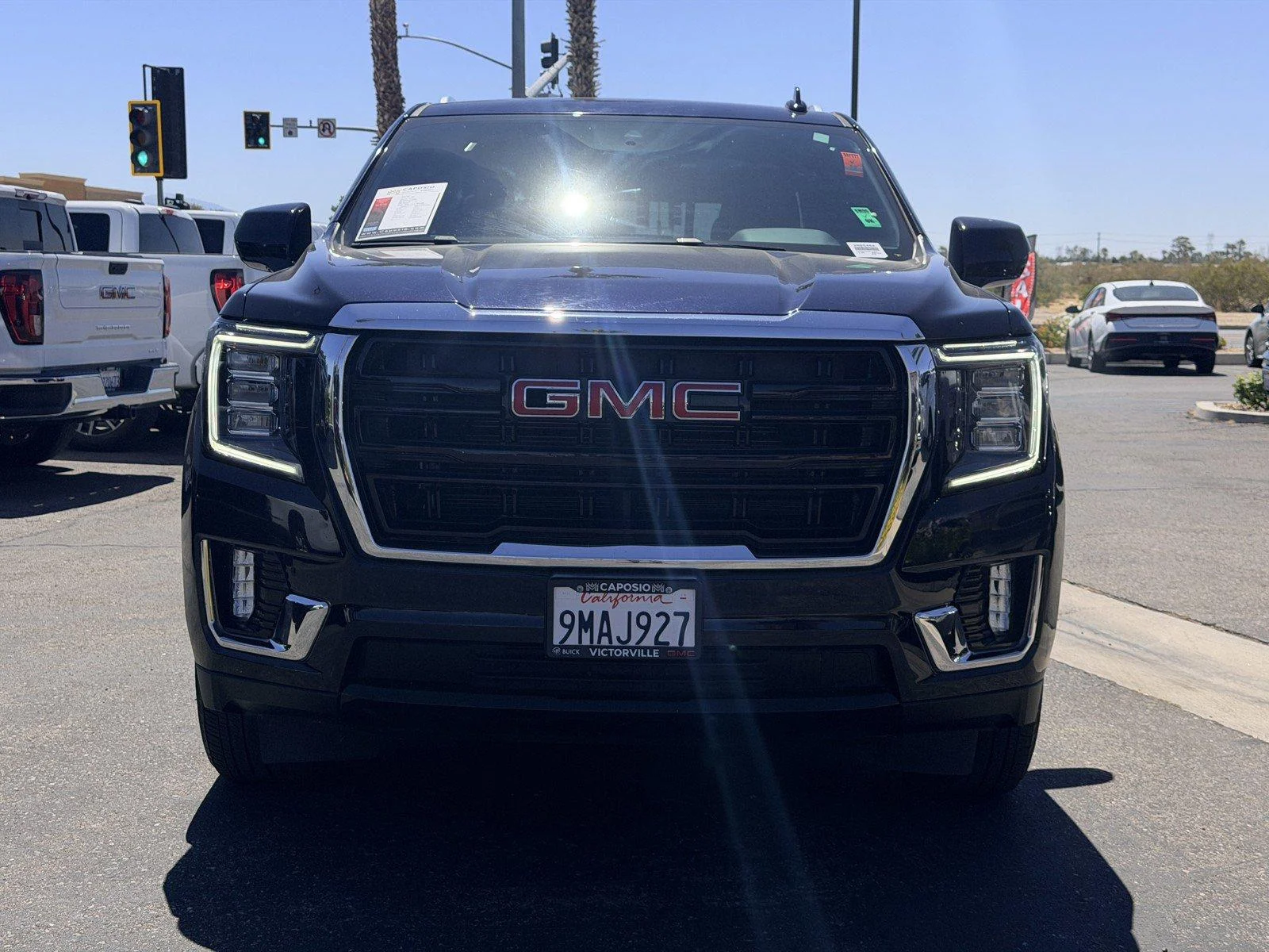 Used 2024 Midnight Blue Metallic GMC SLE image 2
