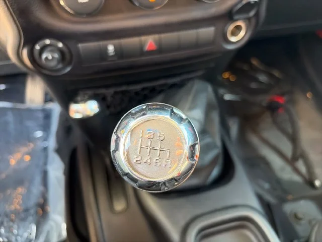 Used 2015 Orange Jeep Unlimited Sport image 13