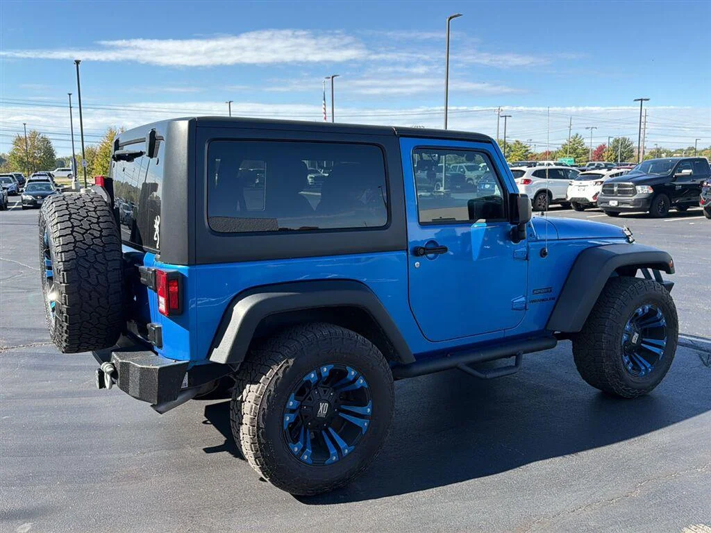 Used 2015 Hydro Blue Pearl Coat Jeep Sport image 8