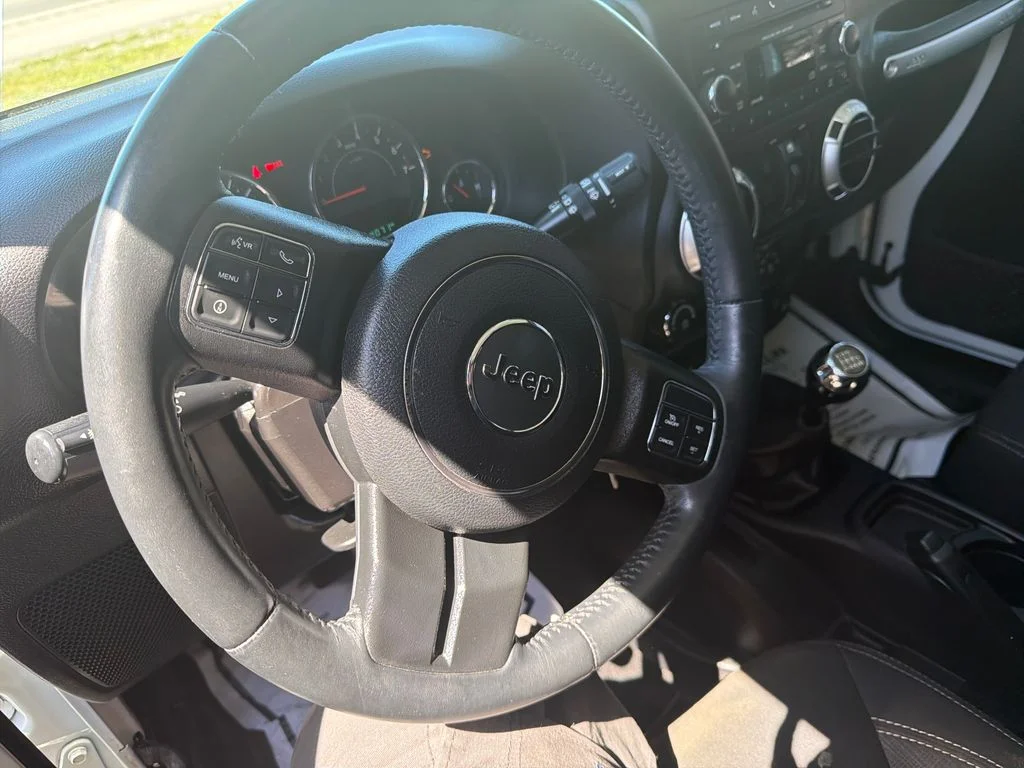 Used 2016 White Jeep Unlimited Sahara image 14