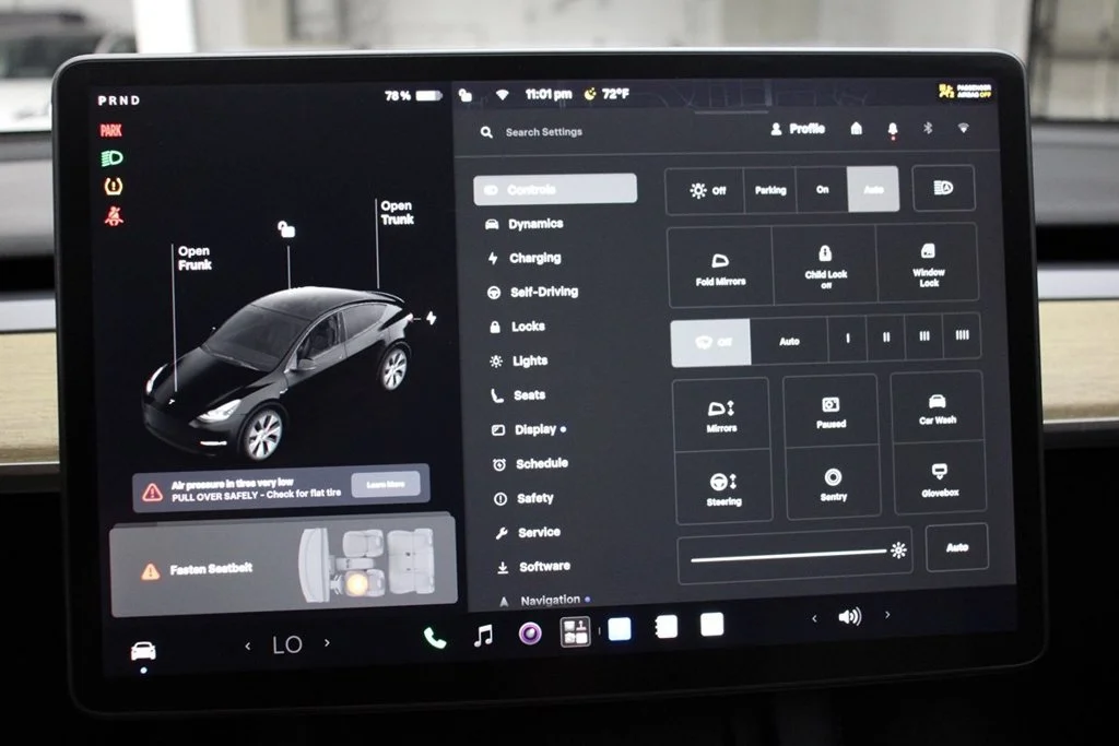 Used 2022 Solid Black Tesla Performance image 22