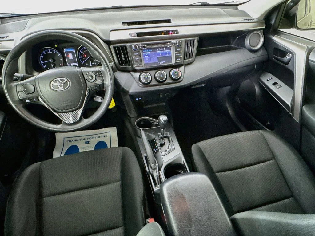 Used 2018 Magnetic Gray Metallic Toyota LE image 25