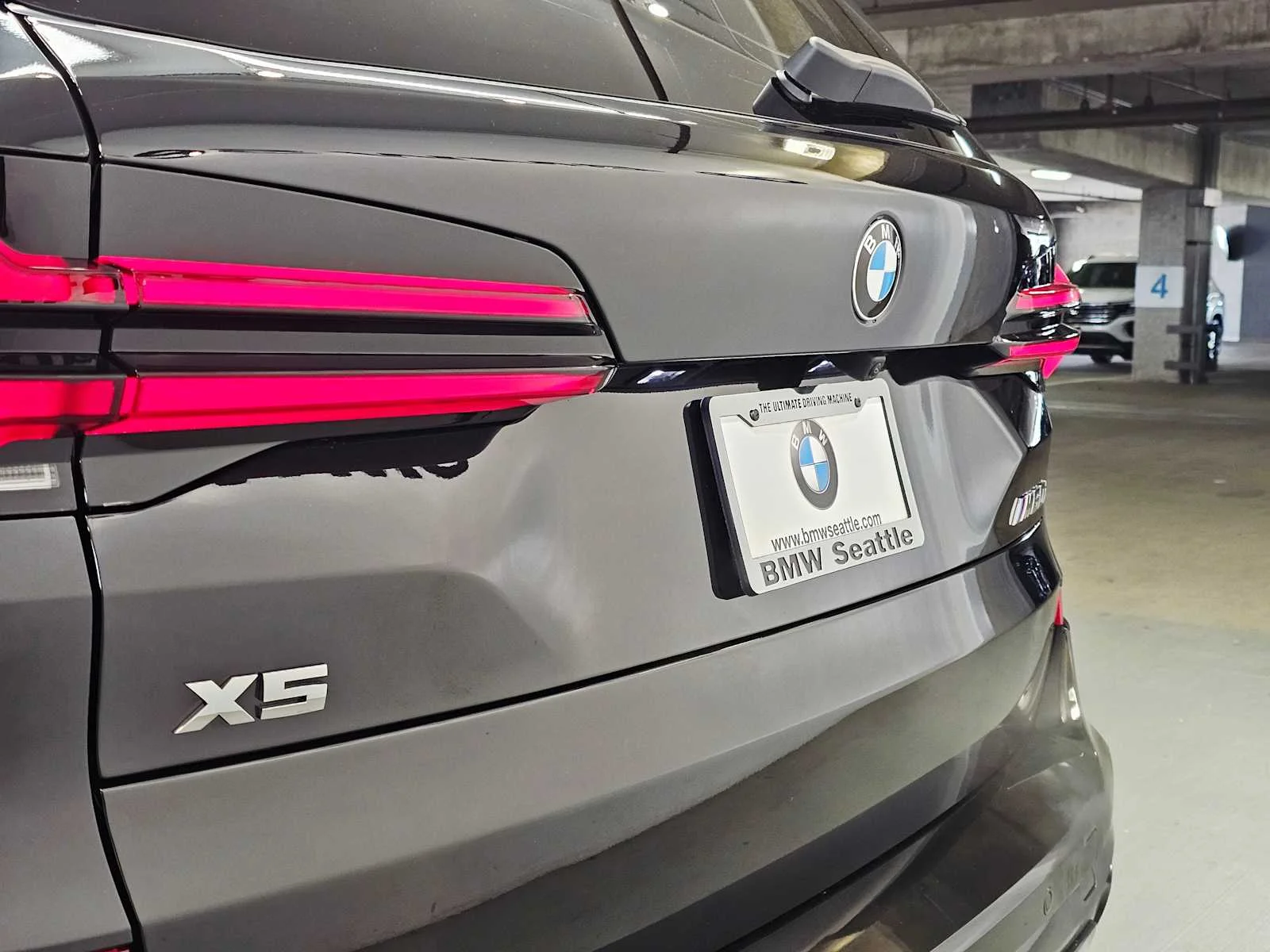 New 2026 Black Sapphire Metallic BMW M60i image 7
