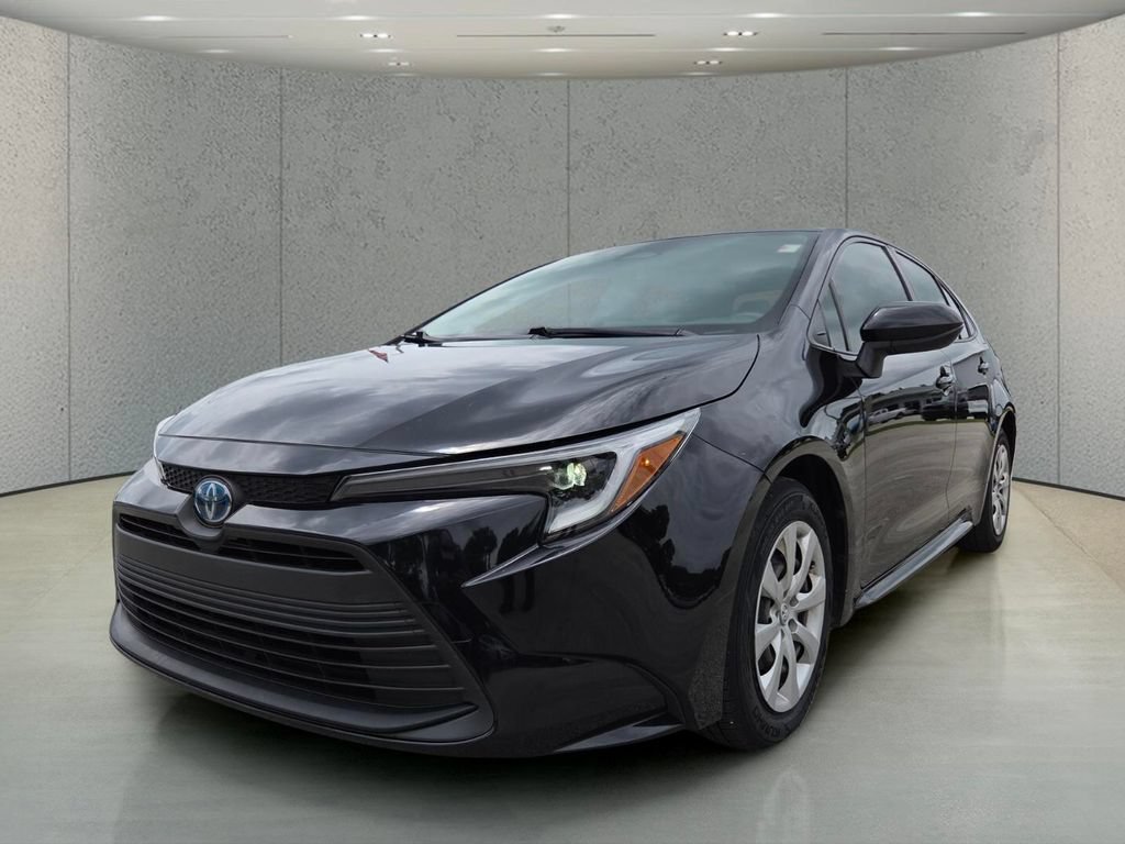 Used 2023 Midnight Black Metallic Toyota Hybrid LE image 11