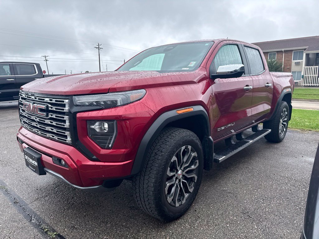 Used 2023 VOLCANIC RED TINTCOAT GMC 4WD Denali image 2