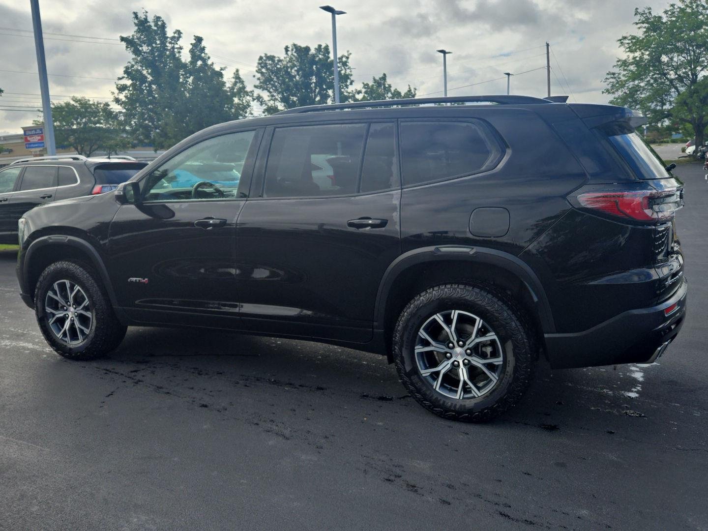 Used 2025 Ebony Twilight Metallic GMC AWD AT4 image 4