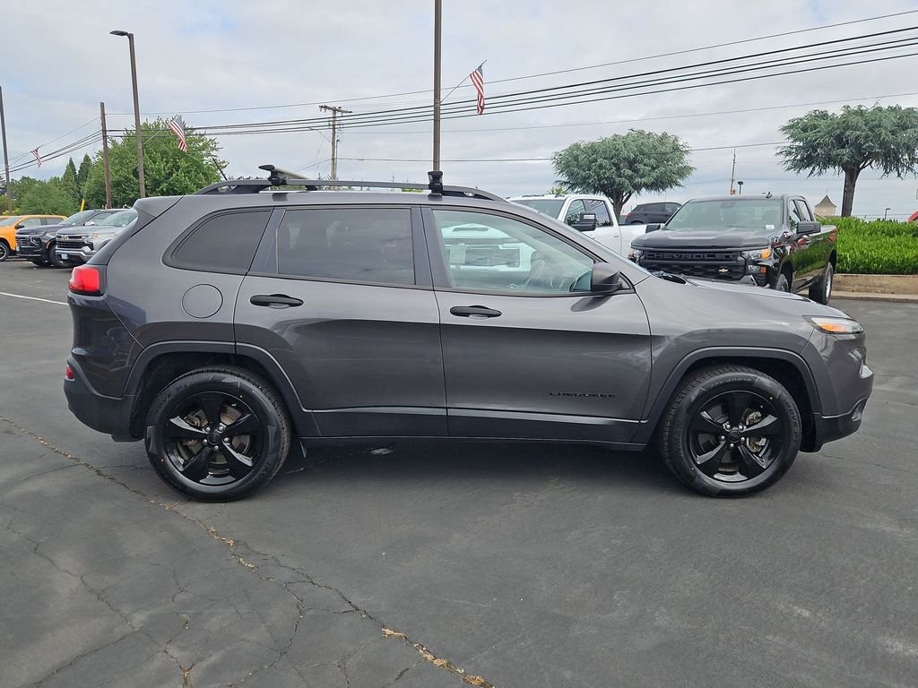 Used 2016 Granite Crystal Metallic Clearcoat Jeep Sport image 7