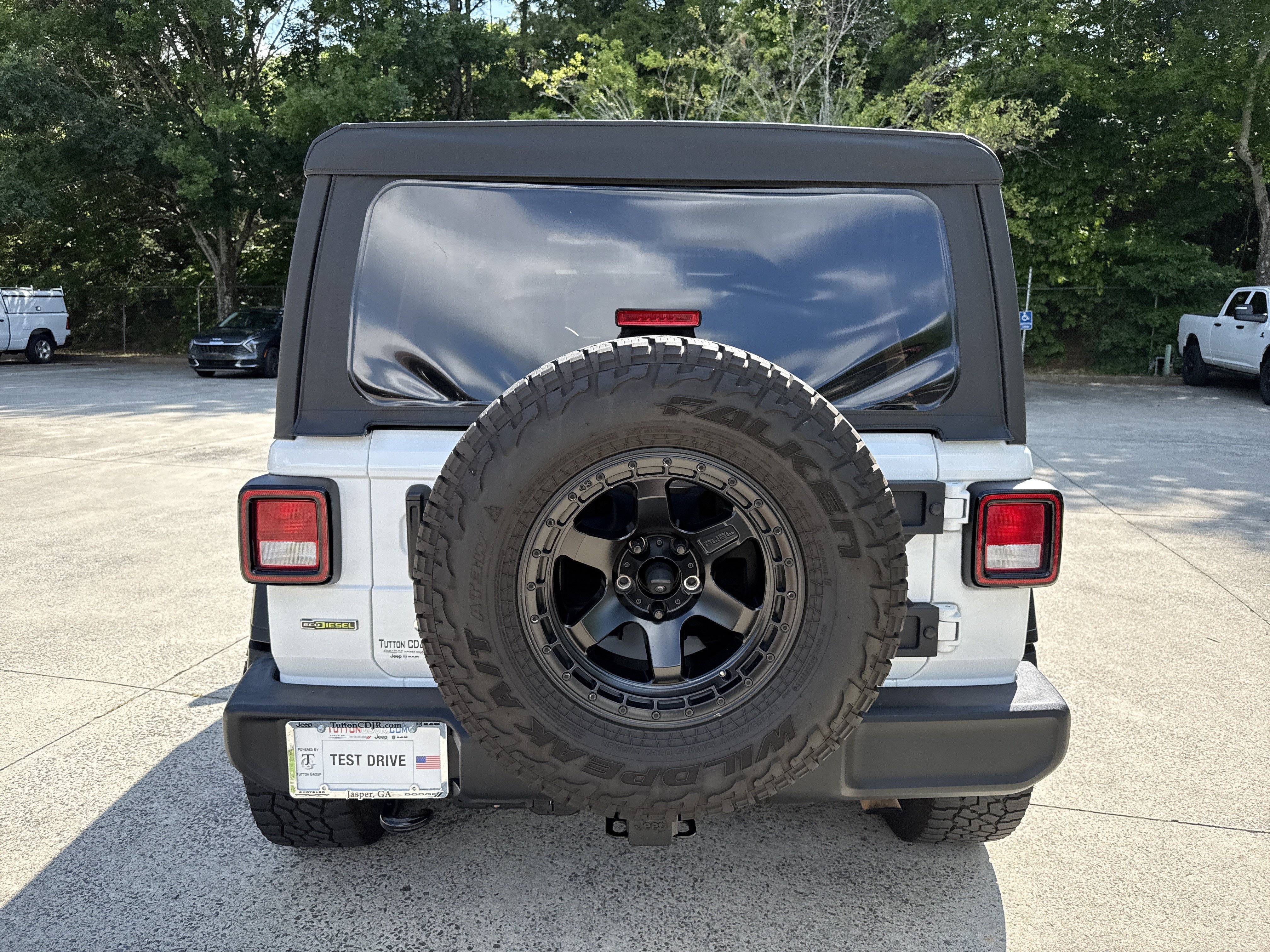 Used 2021 Bright White Clearcoat Jeep Unlimited Sport image 6