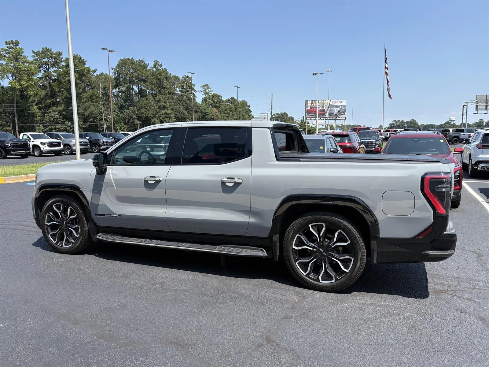 Used 2025 Thunderstorm Gray GMC Max Range Denali image 10