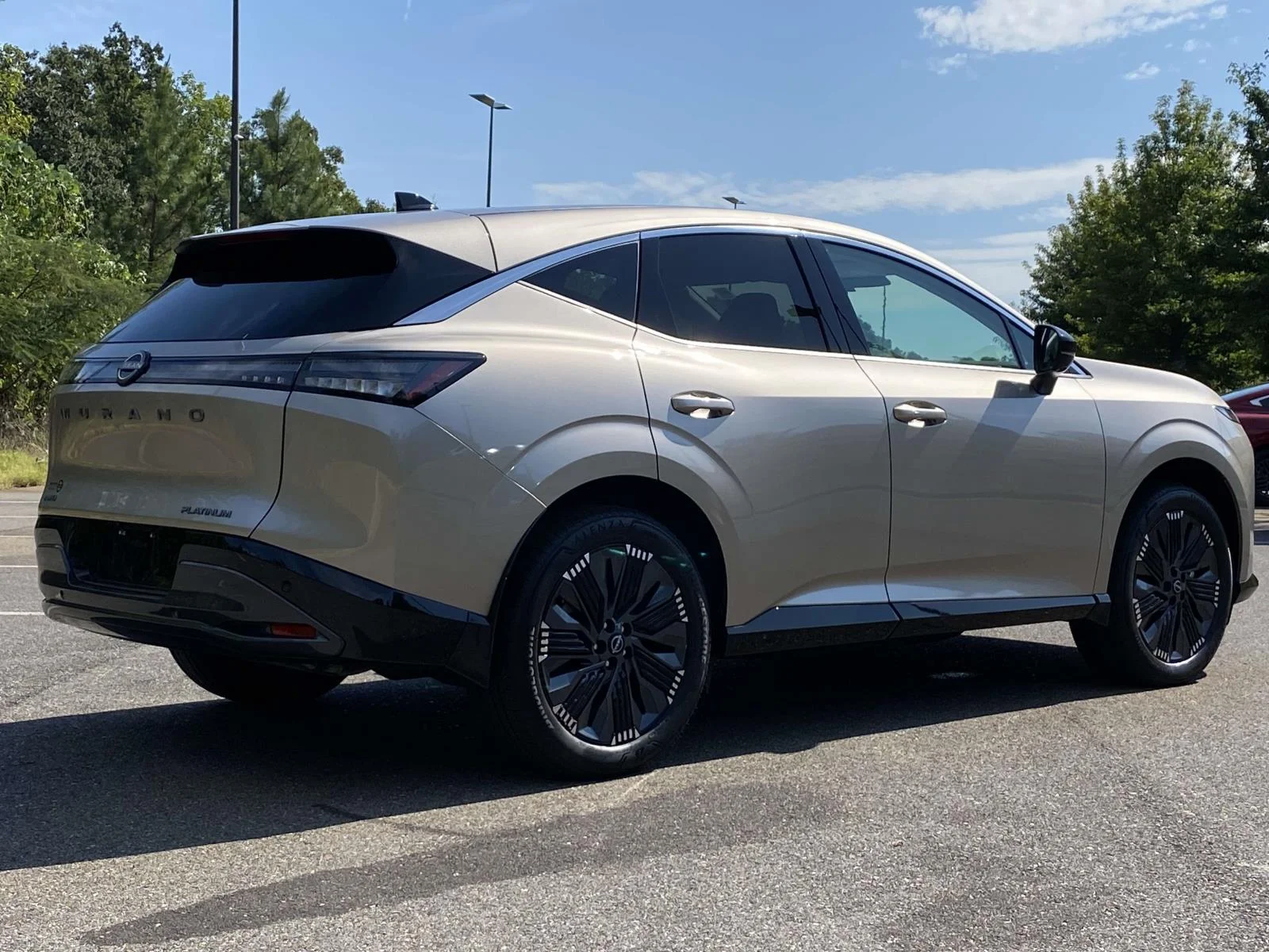 Used 2026 Champagne Silver Metallic Nissan Platinum image 3