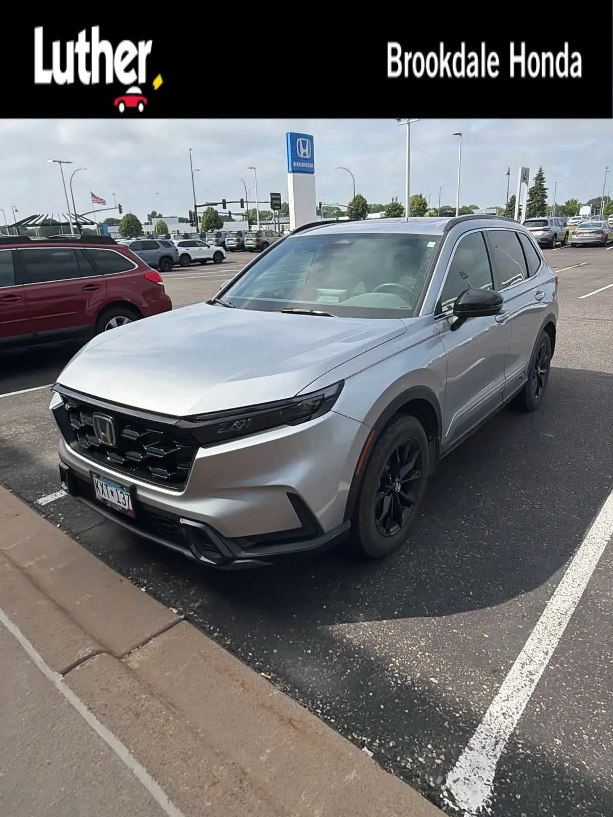 Used 2024 Lunar Silver Metallic Honda Sport-L image 1