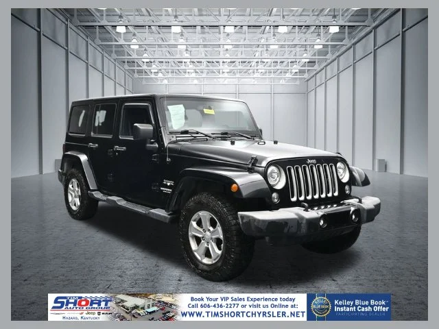 Used 2017 Black Jeep Unlimited Sahara image 1