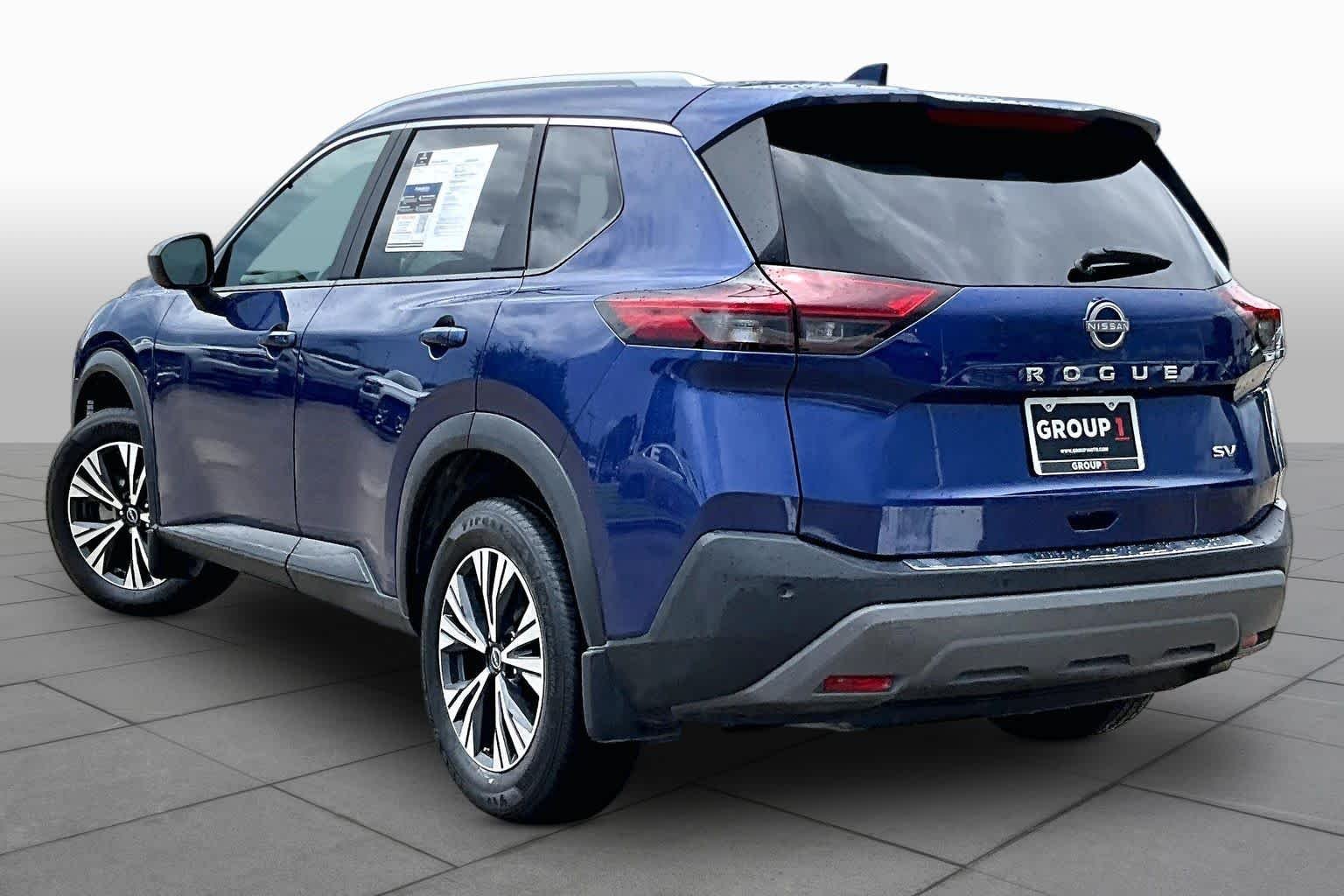 Used 2023 Caspian Blue Metallic Nissan SV image 11