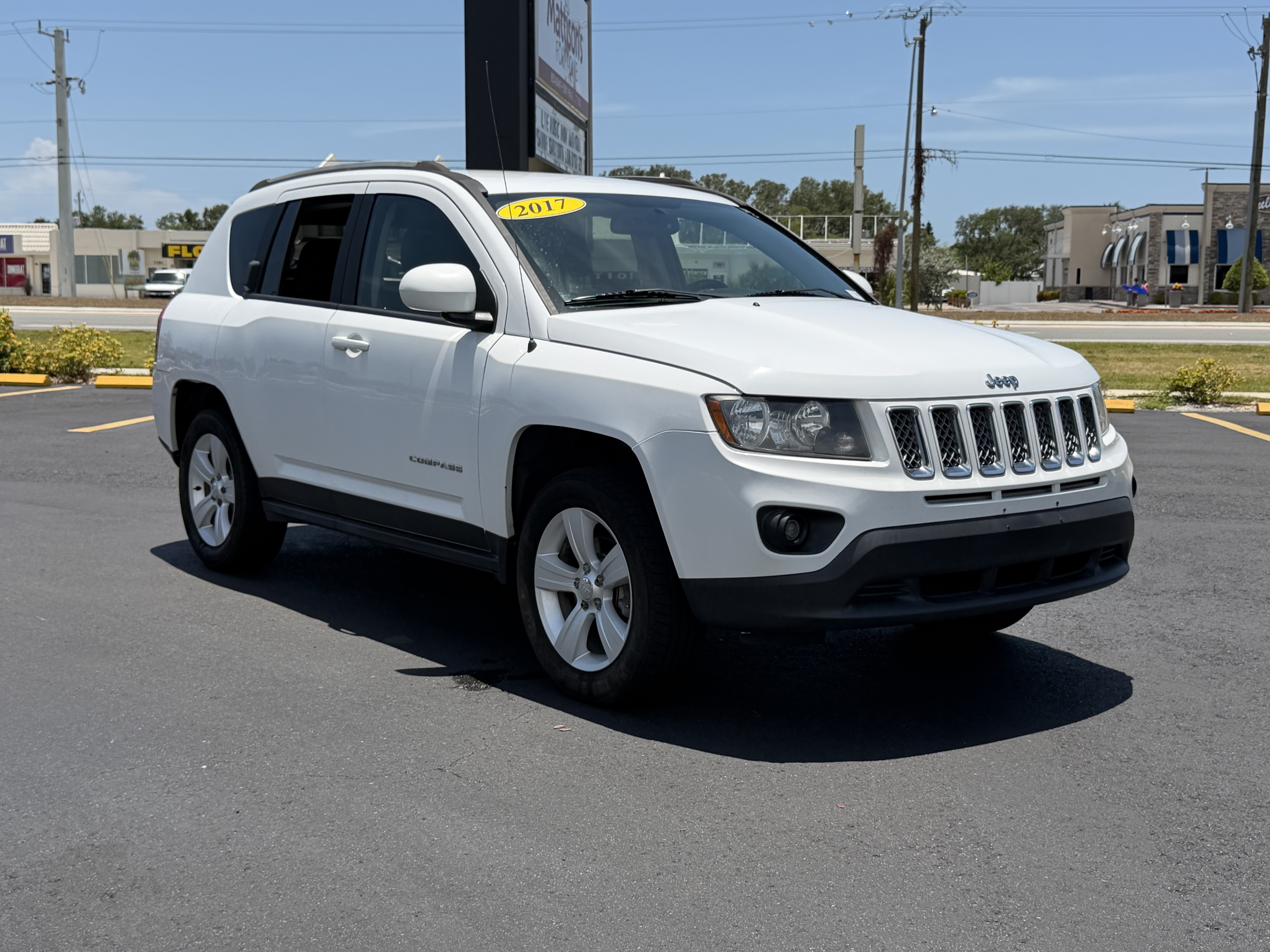 Used 2017 Jeep Compass Latitude with VIN 1C4NJDEB7HD191134 for sale in Sarasota, FL