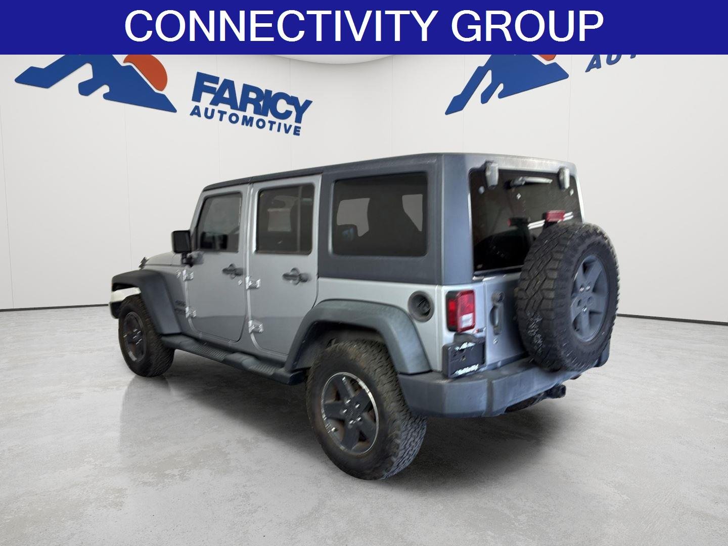 Used 2013 Billet Silver Metallic Jeep Sport image 7