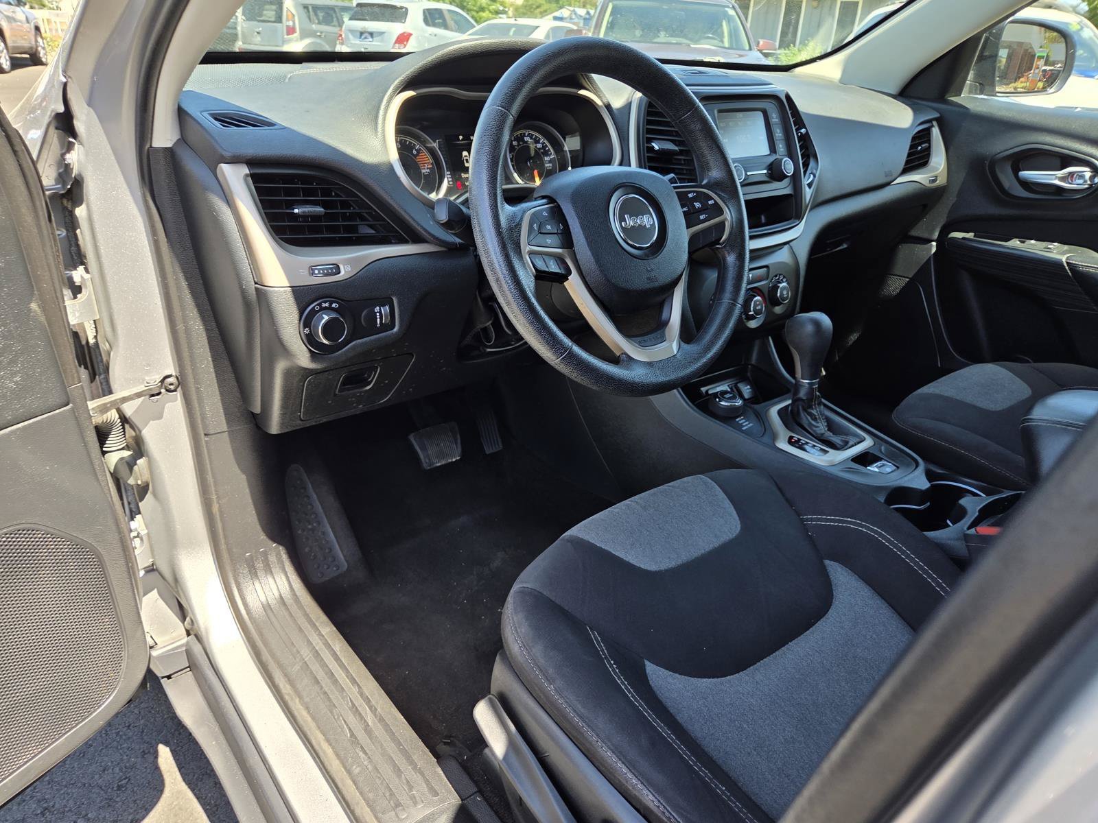 Used 2016 Billet Silver Metallic Clearcoat Jeep Sport image 11