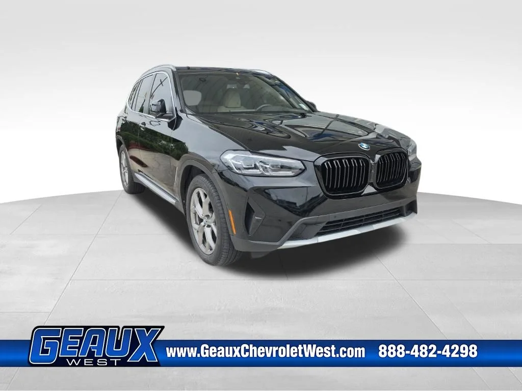 Used 2024 Black BMW sDrive30i image 1