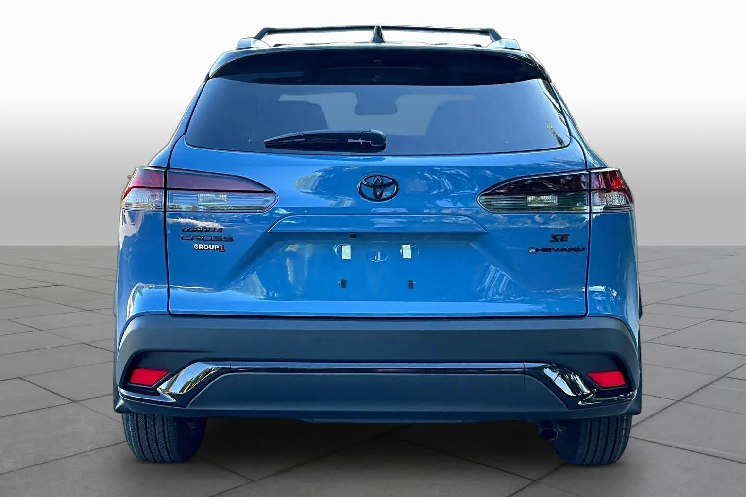 New 2026 Cavalry Blue/Jet Black Toyota Hybrid SE image 4