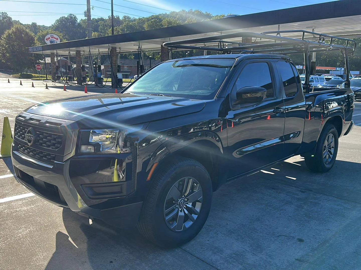 Used 2025 Super Black Nissan SV image 1