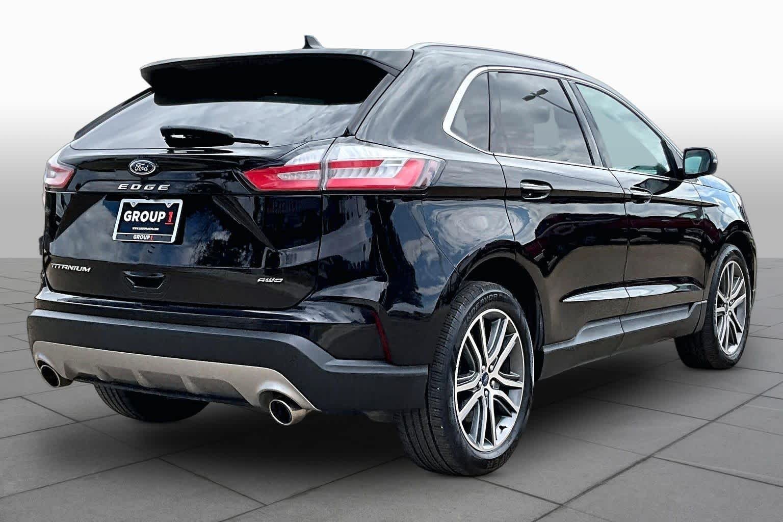 Used 2022 Agate Black Metallic Ford Titanium image 13